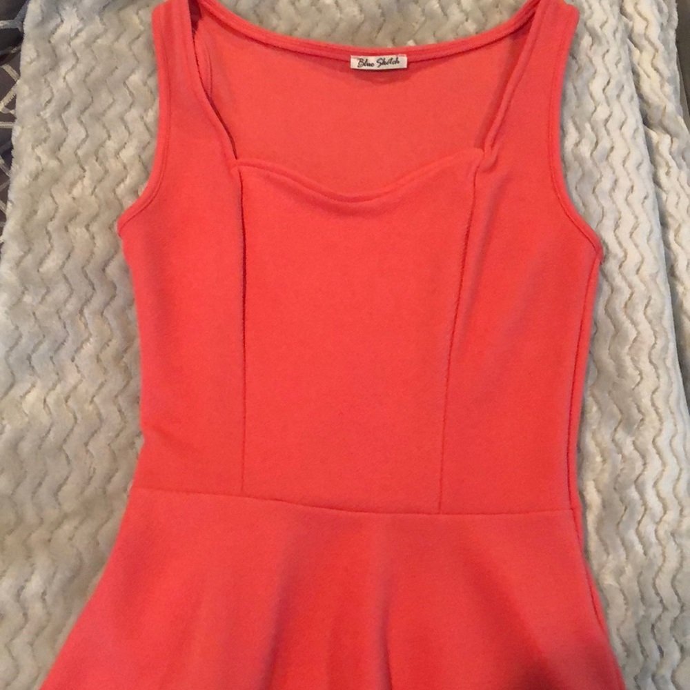 Coral peplum blouse